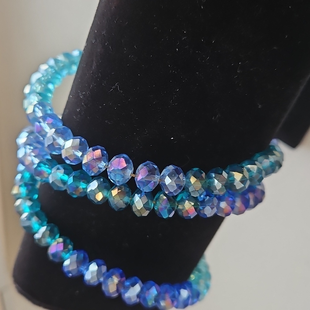 CRYSTAL AB LIGHT BLUE & MEDIUM BLUE Beads on Wire Bracelet. 2 1/2" Dia.